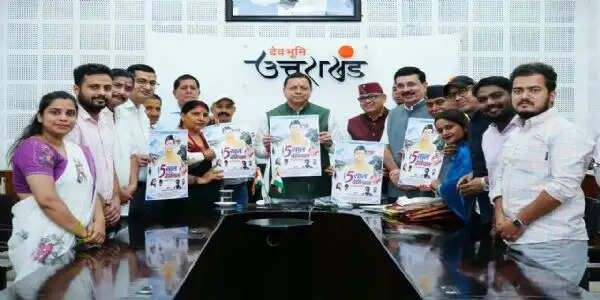 मुख्यमंत्री धामी ने पांच वर्ष के कार्यकाल की उपलब्धियों पर आधारित विशेष एल्बम गीत का किया विमोचन